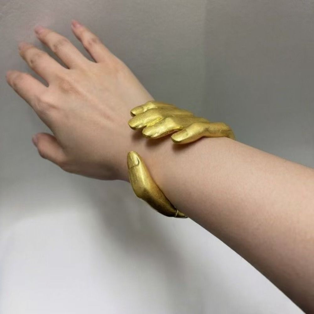 5-Fingered Palm Grip Bracelet  - Luxury Lifestyle Photography 评论和价格